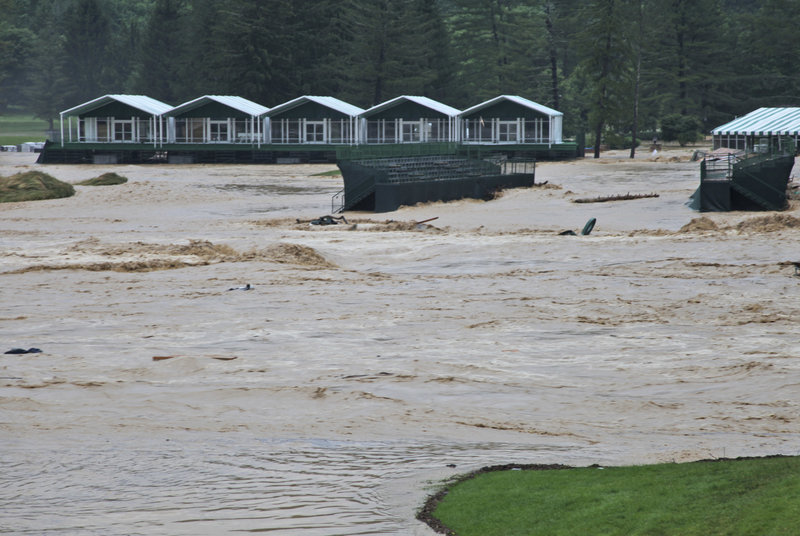 Flooding on the 17th green of the Old White Course at the Greenbrier resort in White Sulphur Springs, W.Va. by Cam Huffman via AP 6-26-2016
