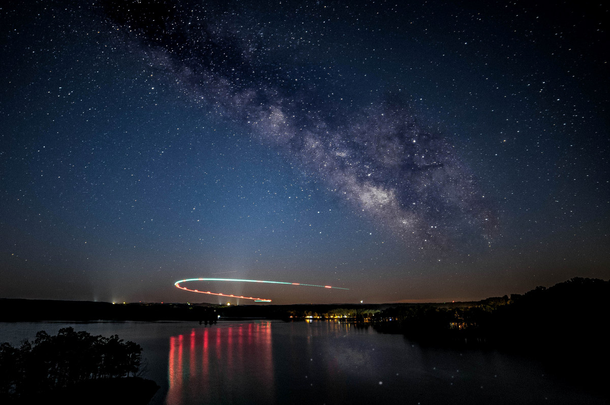 A airplane ascends into the star-spangled sky that extends into northwestern West Virginia - Photo by Anne Johnson
