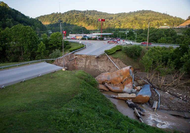 A collapsed bridge on Saturday in Elkview, WV by Kyle Grillot via New York Times 6-26-2016