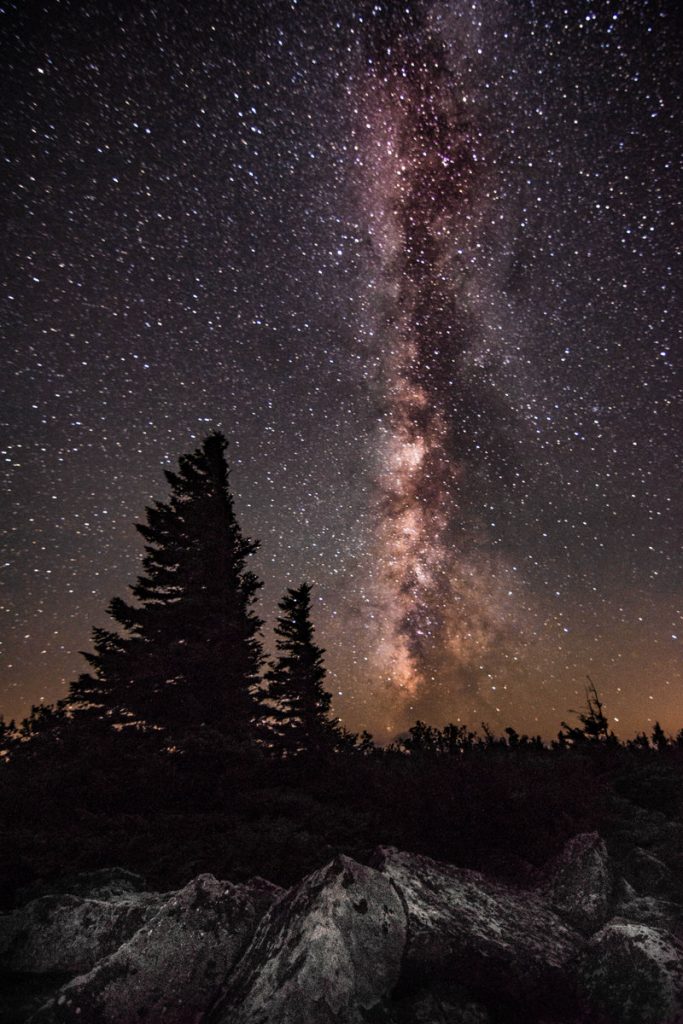 The Milky Way pirouettes in the vast darkness above Dolly Sods, West Virginia - Photo by Anne Johnson