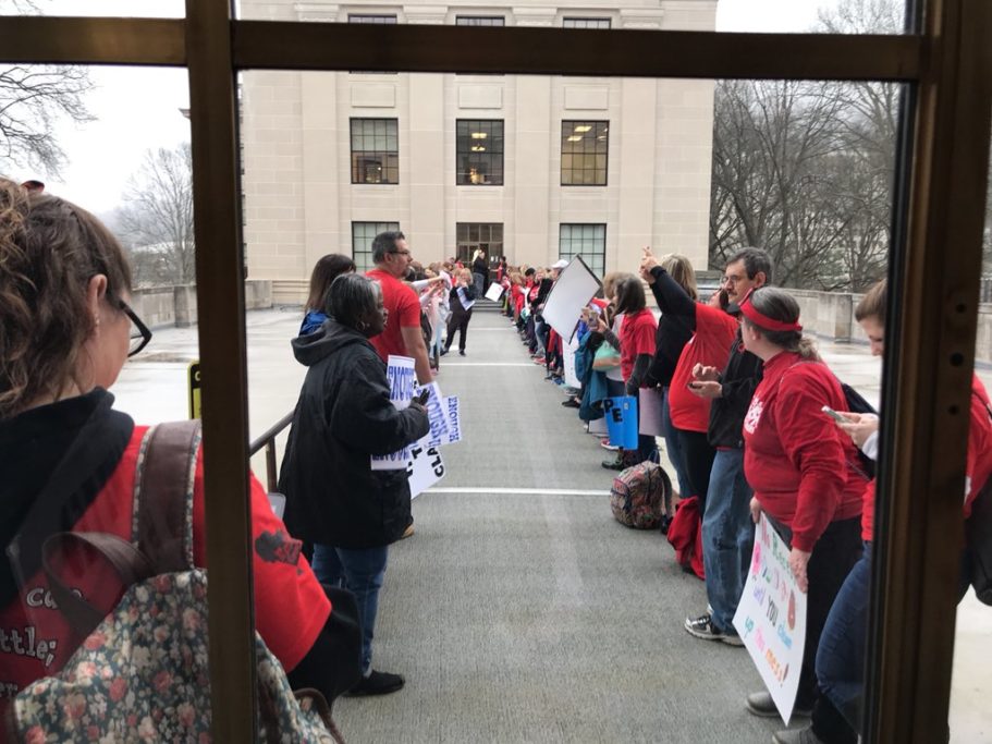 Teachers and school service personnel lined up along the walkway to the West Wing. Photo courtesy Brad McElhinny.