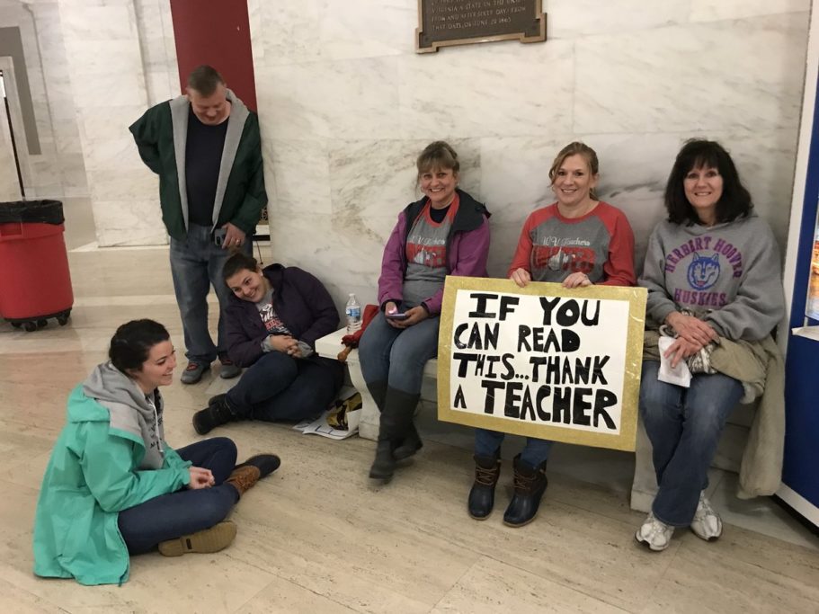 Teachers from Pinch Elementary School take a breather during a rally at the state Capitol. Photo courtesy Brad McElhinny.