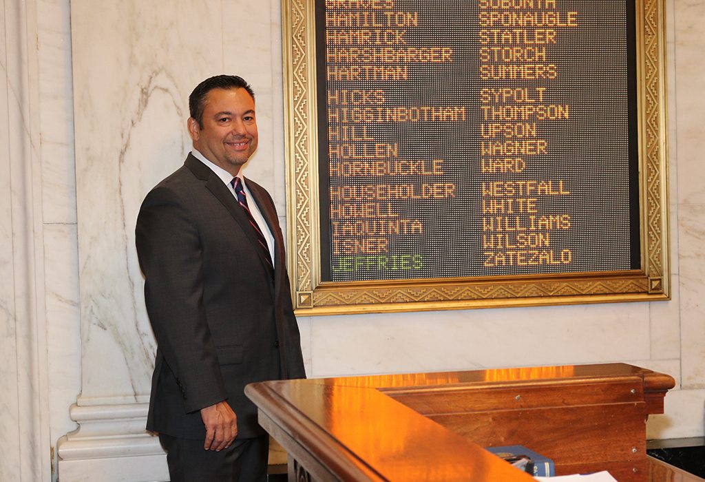 Dean Jeffries next to his name on roll call board. Photo Credit - Mark Burdette